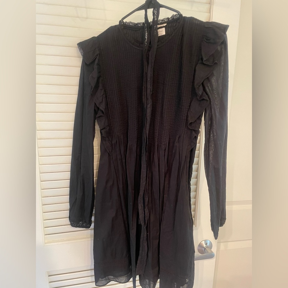 Long sleeve short black dress.